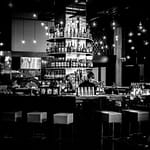 an empty bar. How much spirits are Canadian drinking?