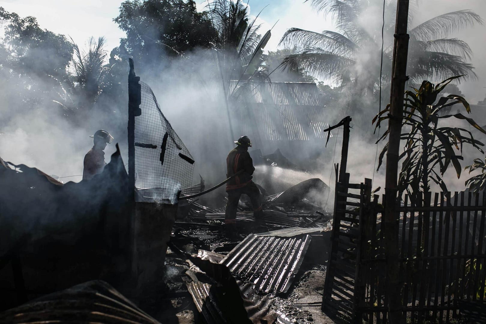 a firemen fighting a fire